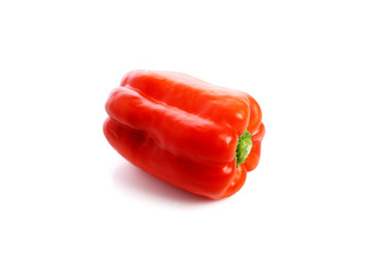 Bright red pepper isolated on white.