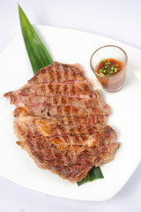Grilled beef steaks isolated over white background set