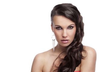 Fototapeta premium brunette with long hair silver earrings