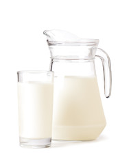 Glass and jar of milk on a white background.
