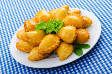Plate full of tasty meat patties