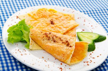 Pancakes stuffed with mashed pumpkin