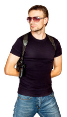 Man with a gun in the holster