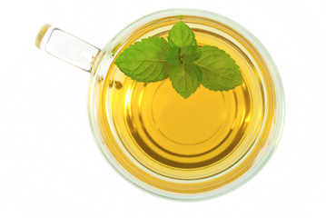 Fototapety  miętowa herbata i liście na białym, widok z góry