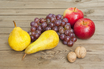 apples grapes and pears, wooden table