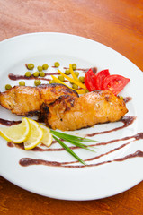 Fried fish in the plate