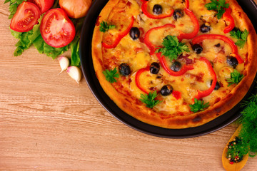 pizza and vegetables on a red background