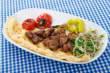 Kebab served in the plate