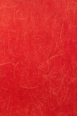 Japanese red paper with gold thread.