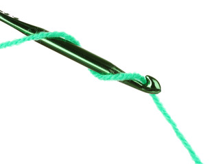 crochet hook and thread isolated on white