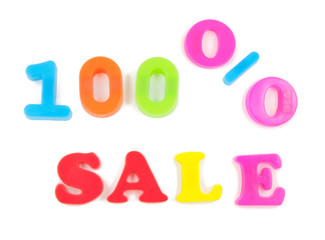 100% sale written in fridge magnets on white