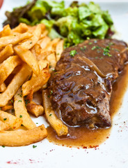 steak beef meat with tomato and french fries