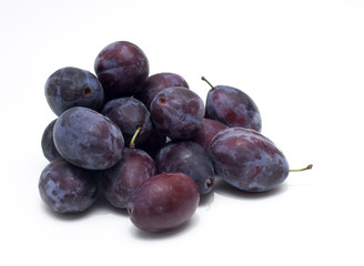 plums on white background