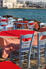 Restaurant by seaside in Mykonos, Greece.