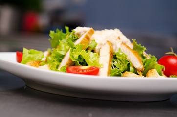 Ceasar salad served in the plate