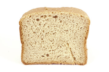 half wheat bread round isolated on white