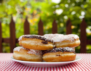 A couple of donuts on table.