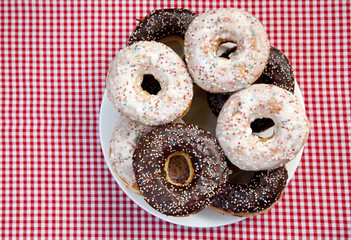 A couple of donuts on table.