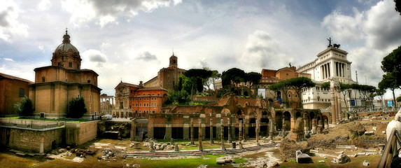 Fototapeta na wymiar Panoramic view on ancient ruins in Rome, Italy.