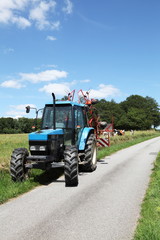 Naklejka premium Farm Road And Tractor Summer vertical