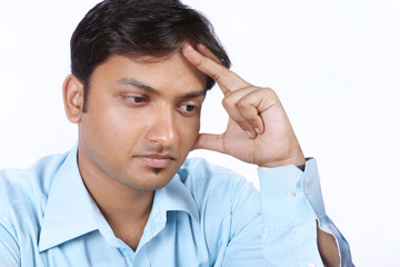 Indian young Businessman  looking depressed