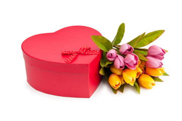 Flowers and gift box isolated on white