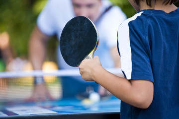 teenager plays Ping-Pong