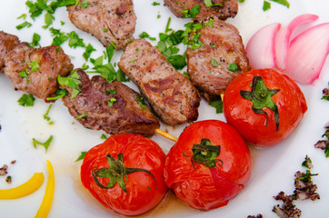 Meat kebab served in plate