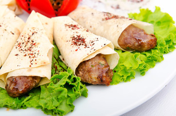 Meat kebabs wrapped in pita