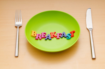 Plate with letters on the white background