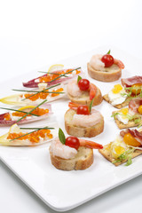 Assorted canapes on tray
