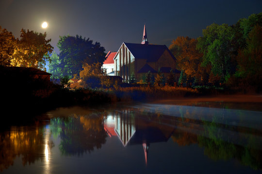 Church at night in Lubycza Krolewska, Poland