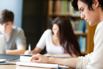 Students working on a paper
