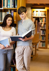 Portrait of students reading a book