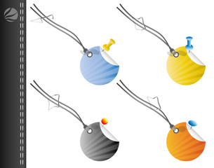 Round tags with string and pins