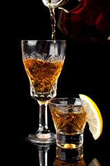 glass of cognac with lemon