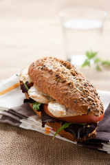 Chicken sandwich, tomato and lettuce