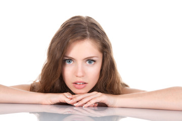Fototapeta premium portrait of beautiful young woman with long curly brown hair