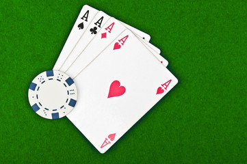 four aces and poker chips
