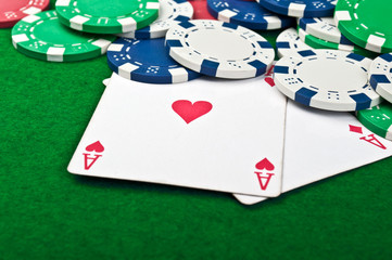 two aces and poker chips