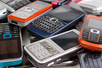Cell phones closeup, old ones and newer ones - 35367377