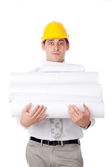 Young man with blueprints.