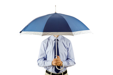 Businessman holding umbrella in the office