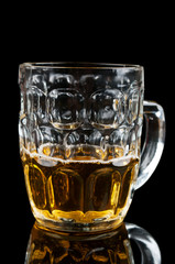 half-full glass of beer