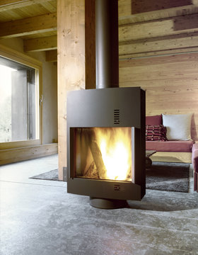 Stufa moderna nel soggiorno di casa in montagna