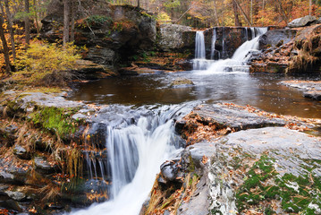 Fototapeta na wymiar Autumn Waterfall in mountain