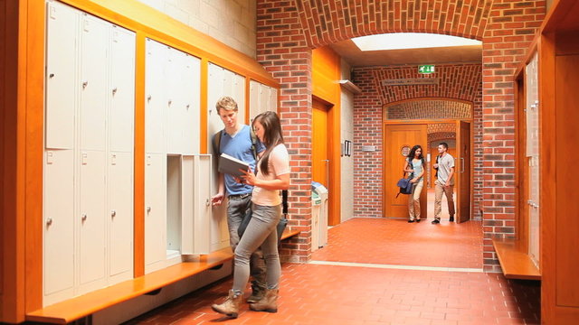 Students walking while ignoring their classmates