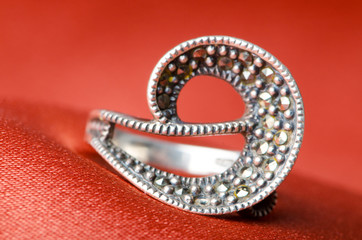 Fashion concept with ring on background