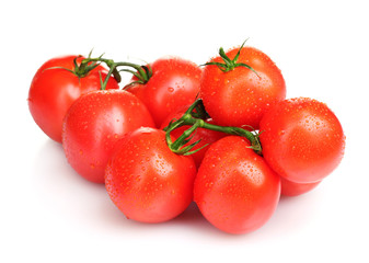 Ripe red tomatoes isolated on white