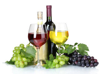 Ripe grapes, wine glasses and bottles of wine isolated on white